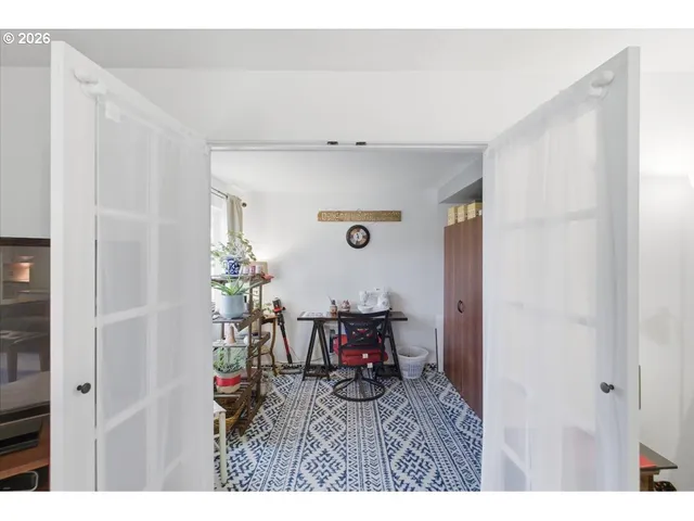 a view of a livingroom with furniture and window