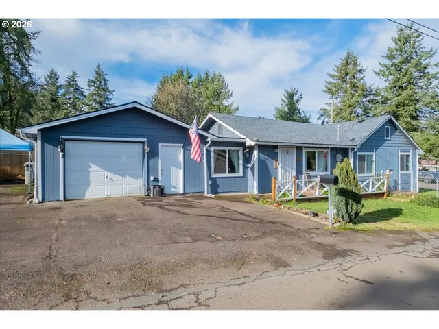 a view of house with outdoor space and seating area
