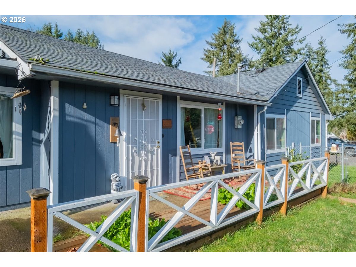 2295 Cedar Street Sweet Home, OR 97386 - Photo 28 of 32 a view of an house with backyard space and balcony