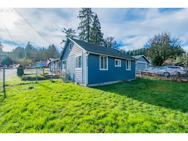 a house view with a garden space