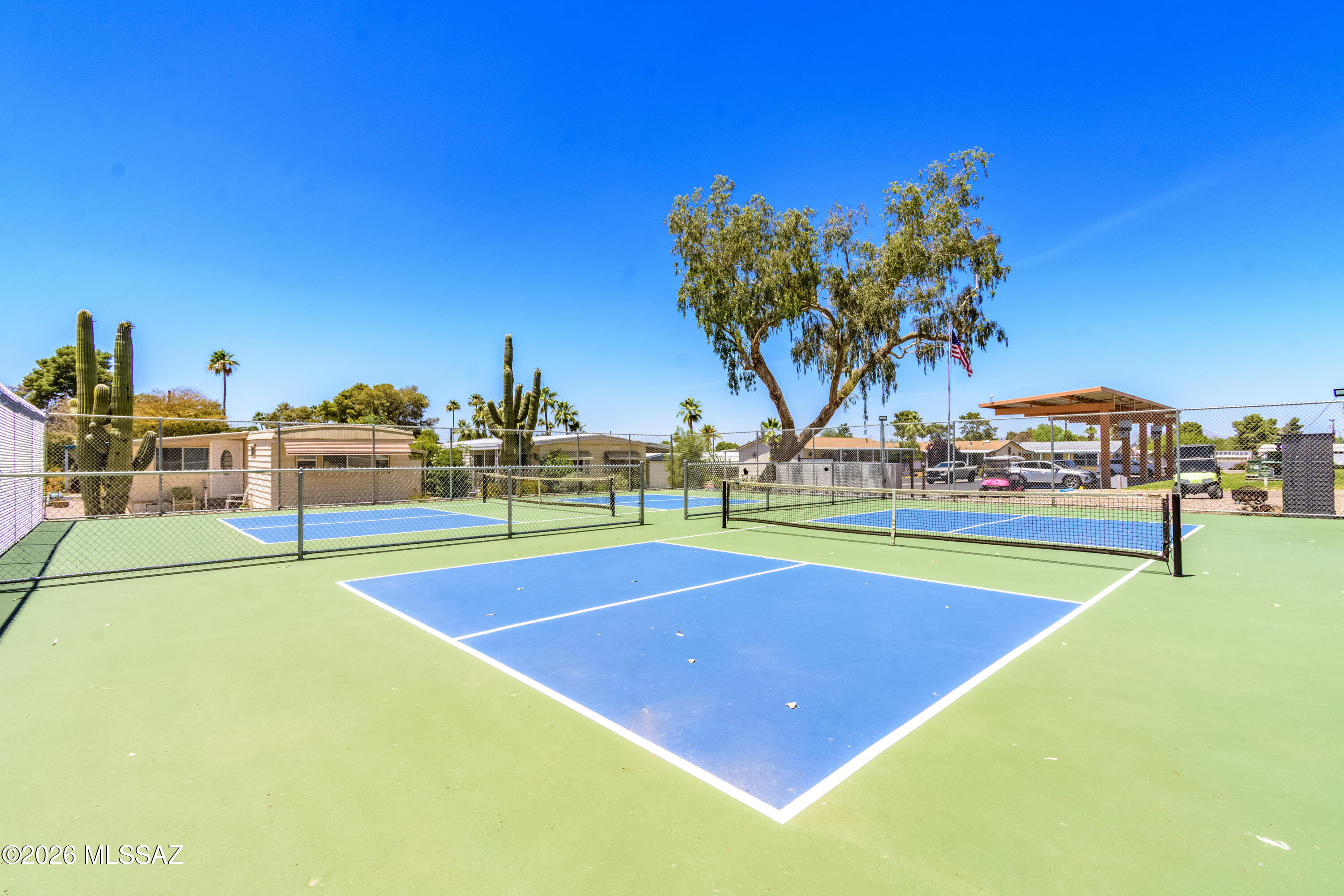 4550 North Flowing Wells Road, Unit 155 Tucson, AZ 85705 - Photo 33 of 40 a view of an outdoor space and basketball court