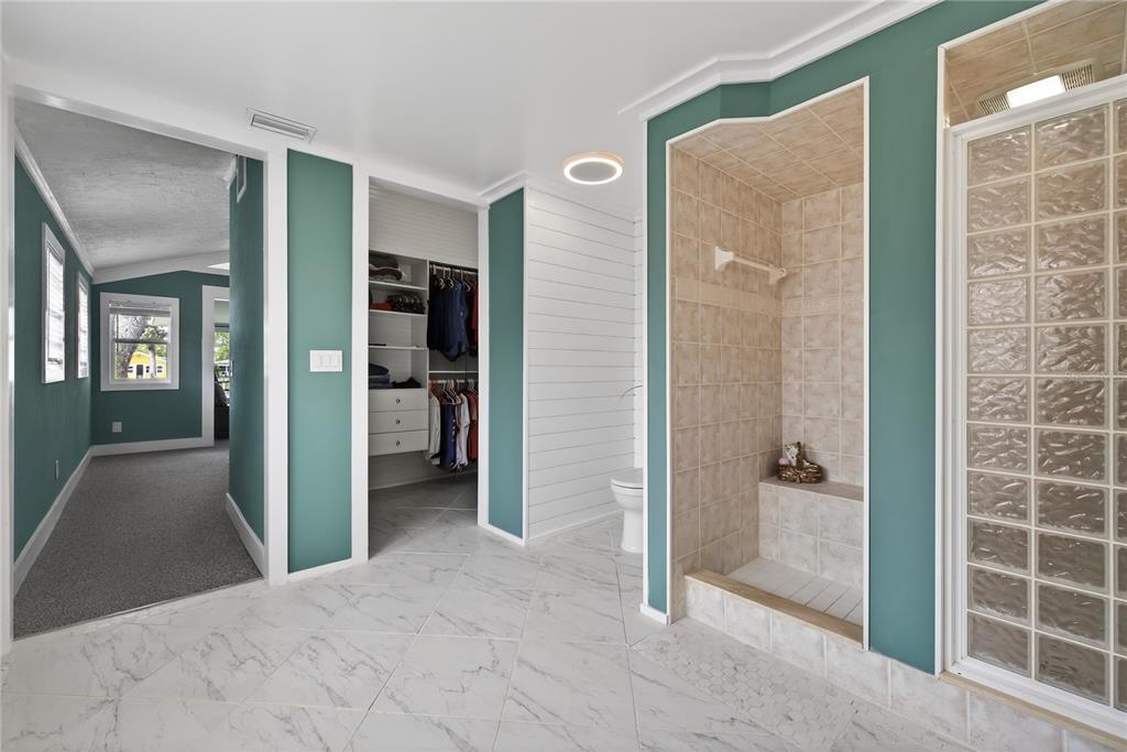 5851 Rio Drive New Port Richey, FL 34652 - Photo 24 of 50 a view of a bathroom from a hallway