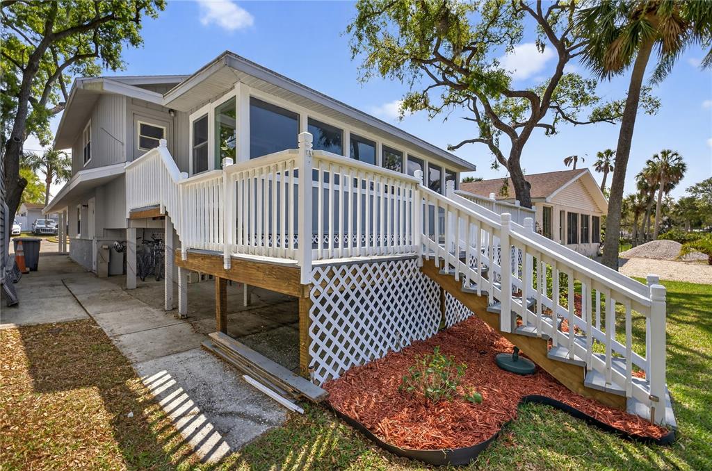 5851 Rio Drive New Port Richey, FL 34652 - Photo 35 of 50 a view of a house with a deck