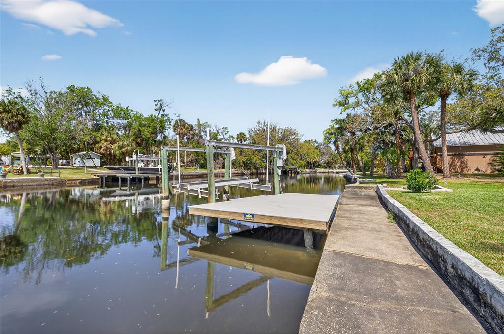 5851 Rio Drive New Port Richey, FL 34652 - Photo 6 of 50 a view of a lake with sitting area