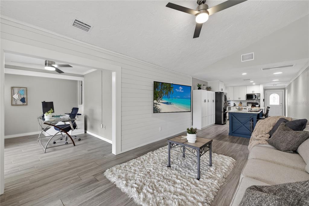 5851 Rio Drive New Port Richey, FL 34652 - Photo 10 of 50 a living room with furniture and a rug