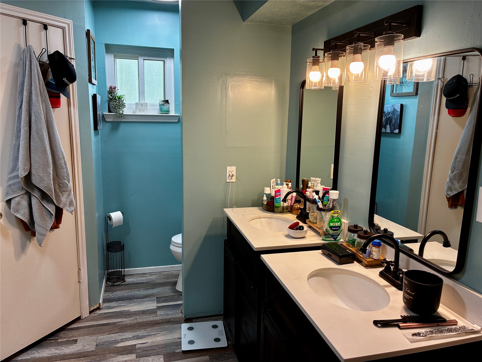 2 Sarita Road Angleton, TX 77515 - Photo 10 of 21 a bathroom with a sink double vanity and a mirror