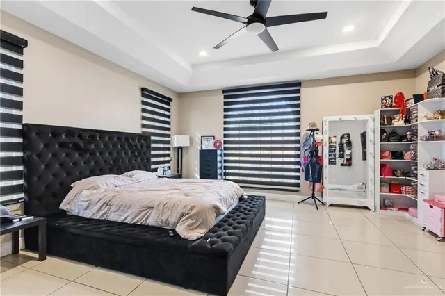 a bedroom with a bed and a walk in closet