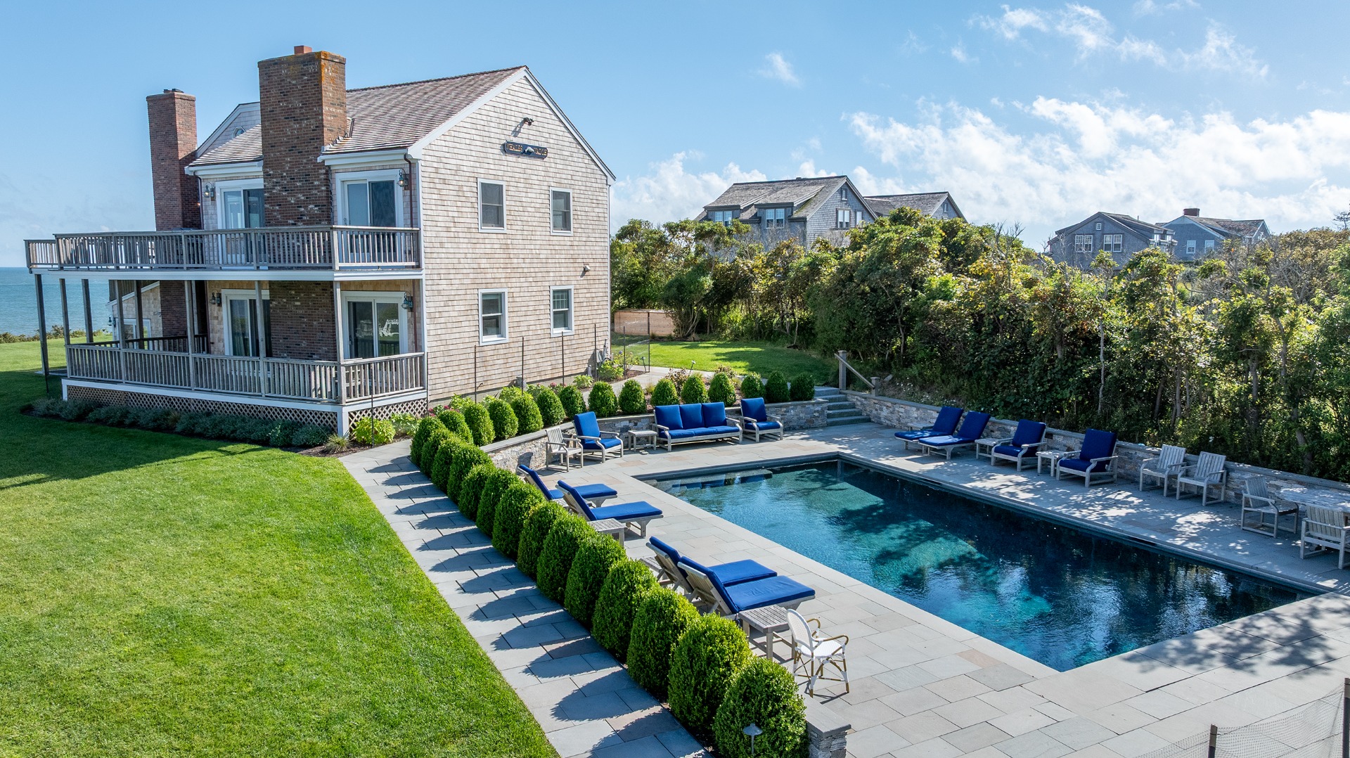 1 Reeds Way Nantucket, MA 02554 - Photo 4 of 51 a view of house with swimming pool and trees in the background