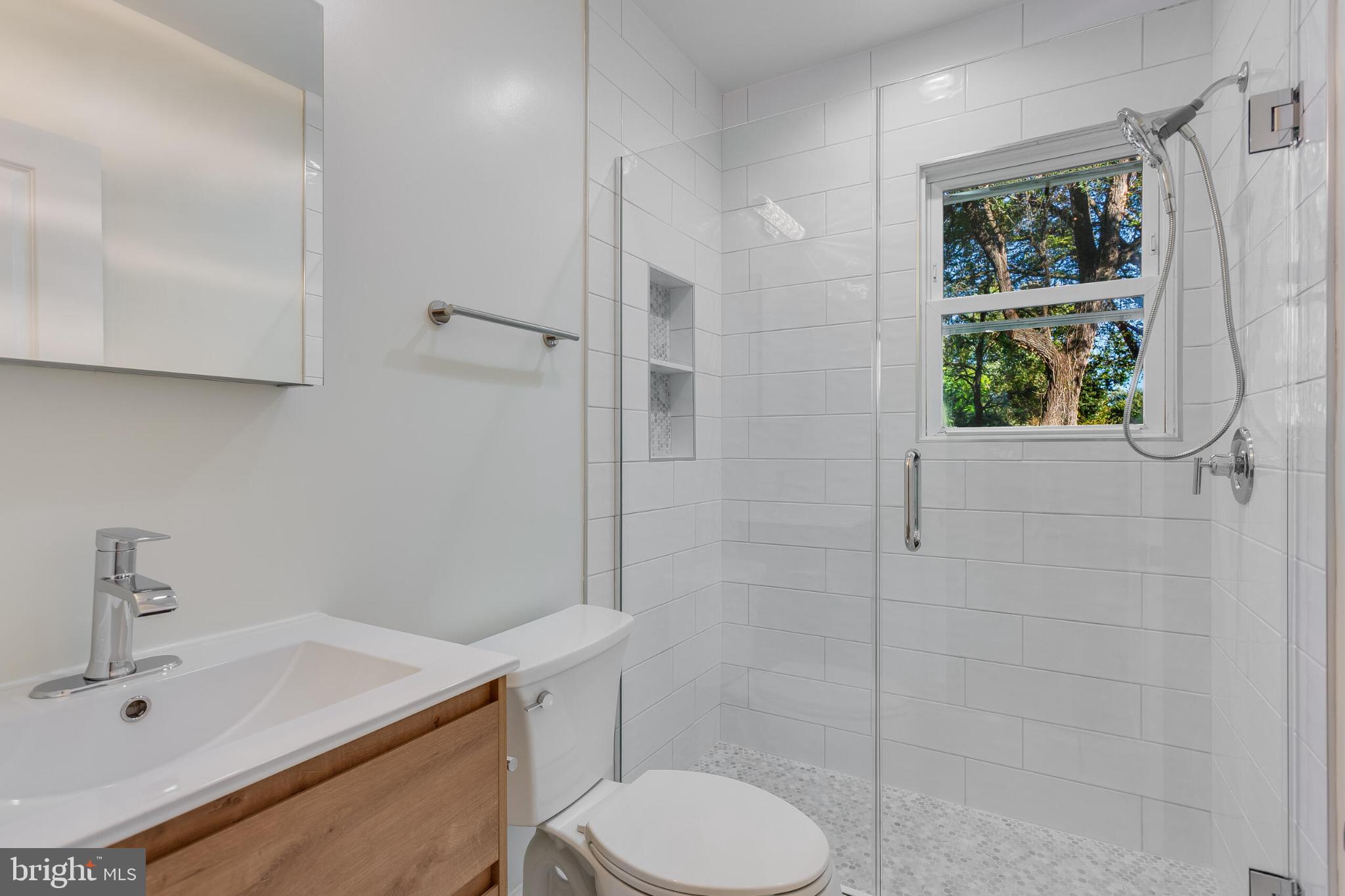 304 Franklin Place Silver Spring, MD 20901 - Photo 16 of 27 Modern bathroom with natural light.