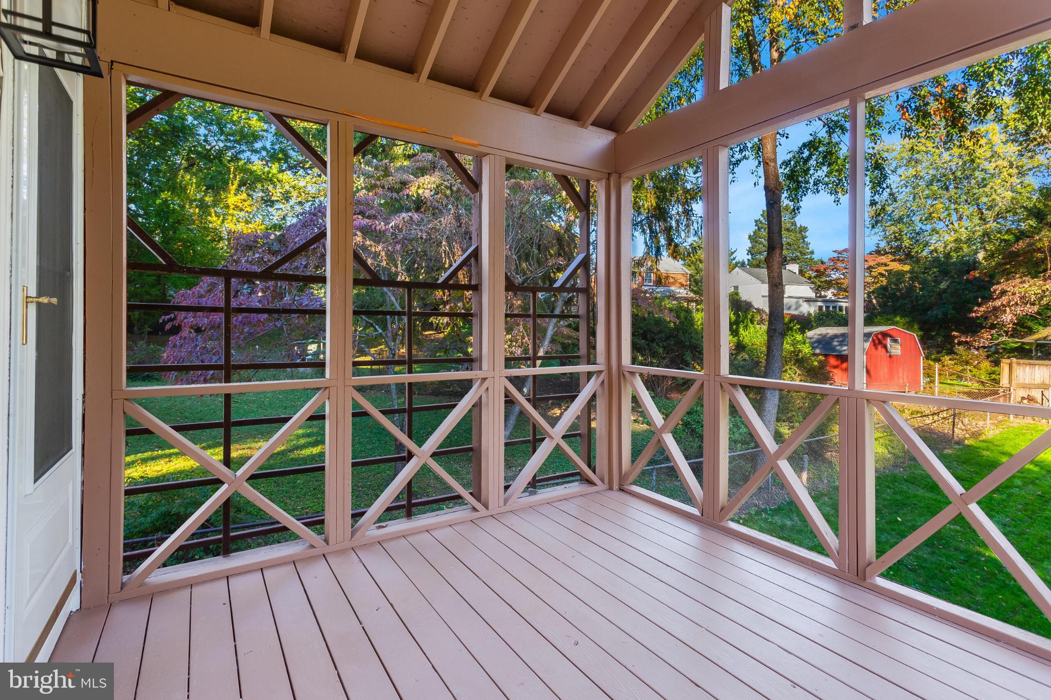 304 Franklin Place Silver Spring, MD 20901 - Photo 26 of 27 Serene screened porch with garden views.