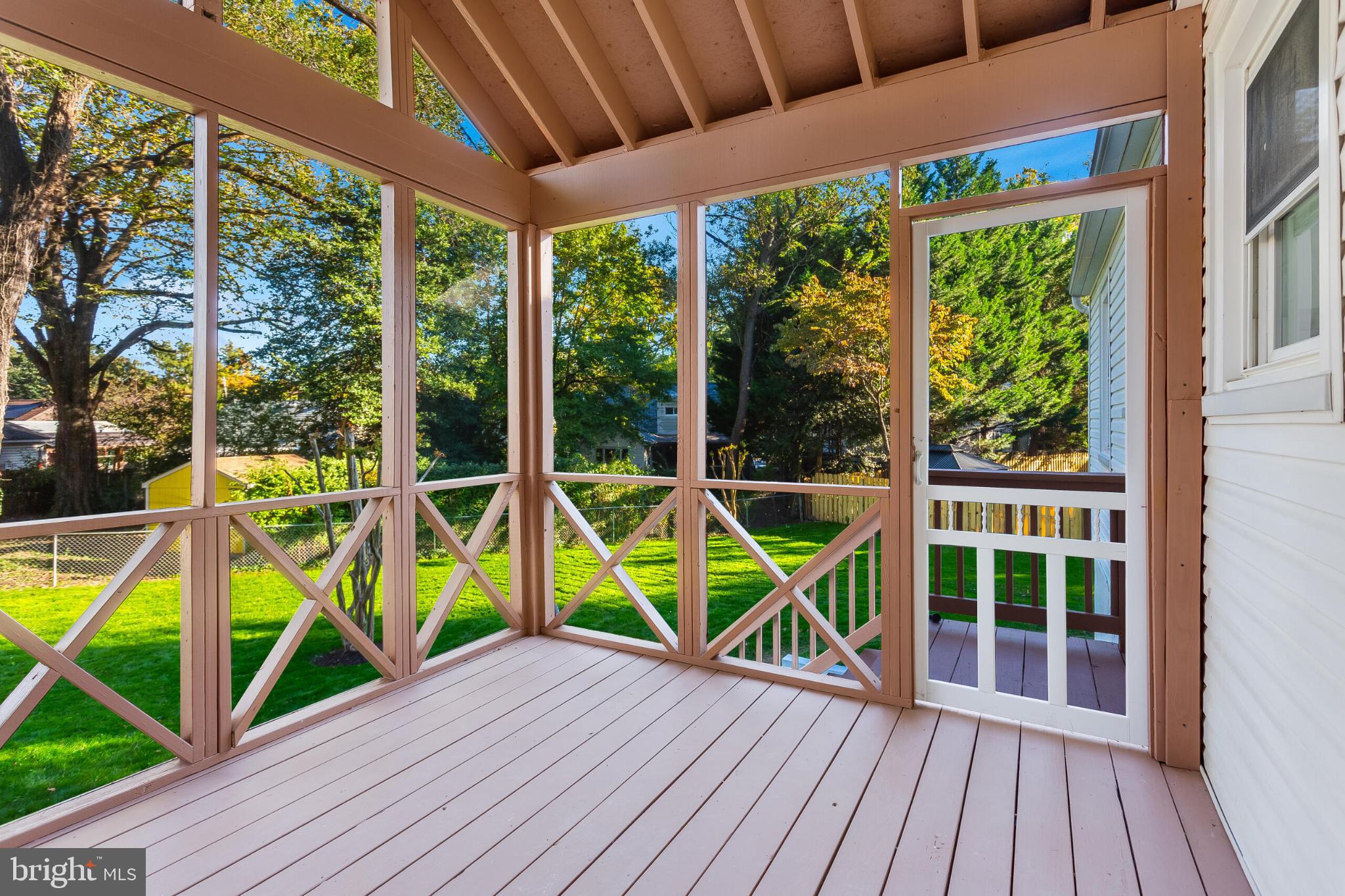 304 Franklin Place Silver Spring, MD 20901 - Photo 27 of 27 Serene screened porch with lush views.