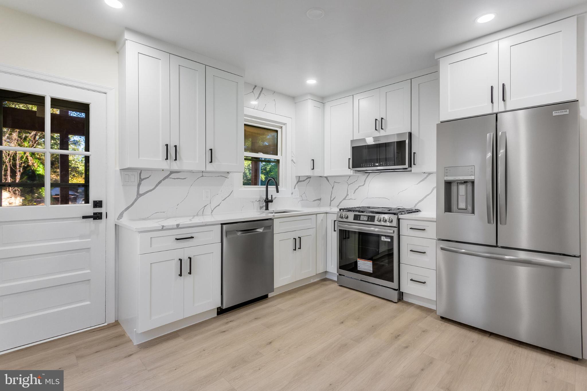 304 Franklin Place Silver Spring, MD 20901 - Photo 10 of 27 Modern kitchen with sleek finishes.