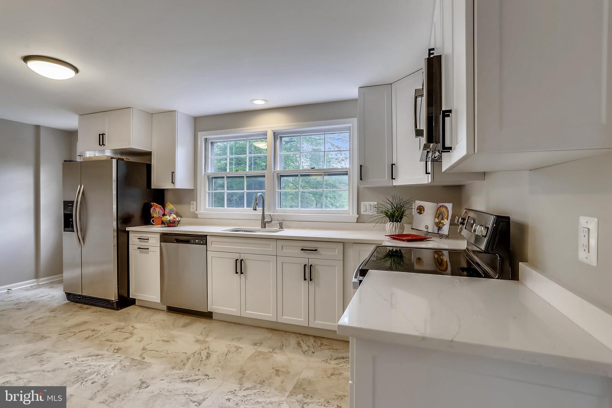 9709 Digging Road Montgomery Village, MD 20886 - Photo 15 of 69 Kitchen with Quartz Countertops