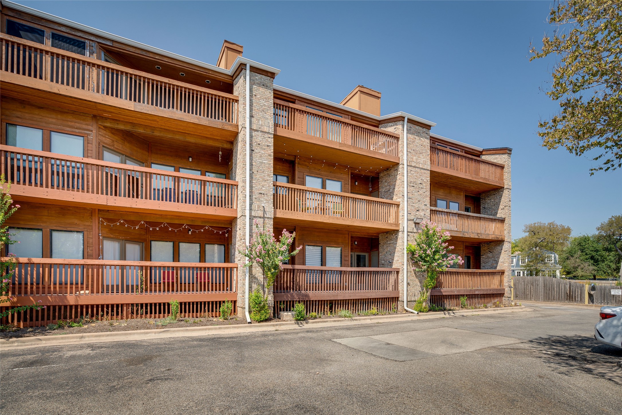 1406 Windsor Road, Unit 201 Austin, TX 78703 - Photo 2 of 32 front view of a building with a street