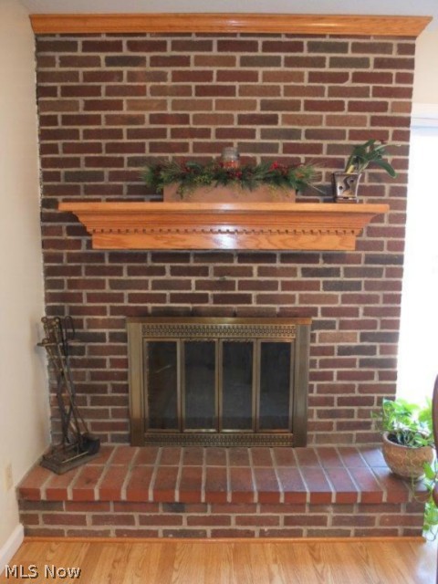 3185 Mayfair Road Akron, OH 44312 - Photo 10 of 14 Wood burning fireplace in dinette.