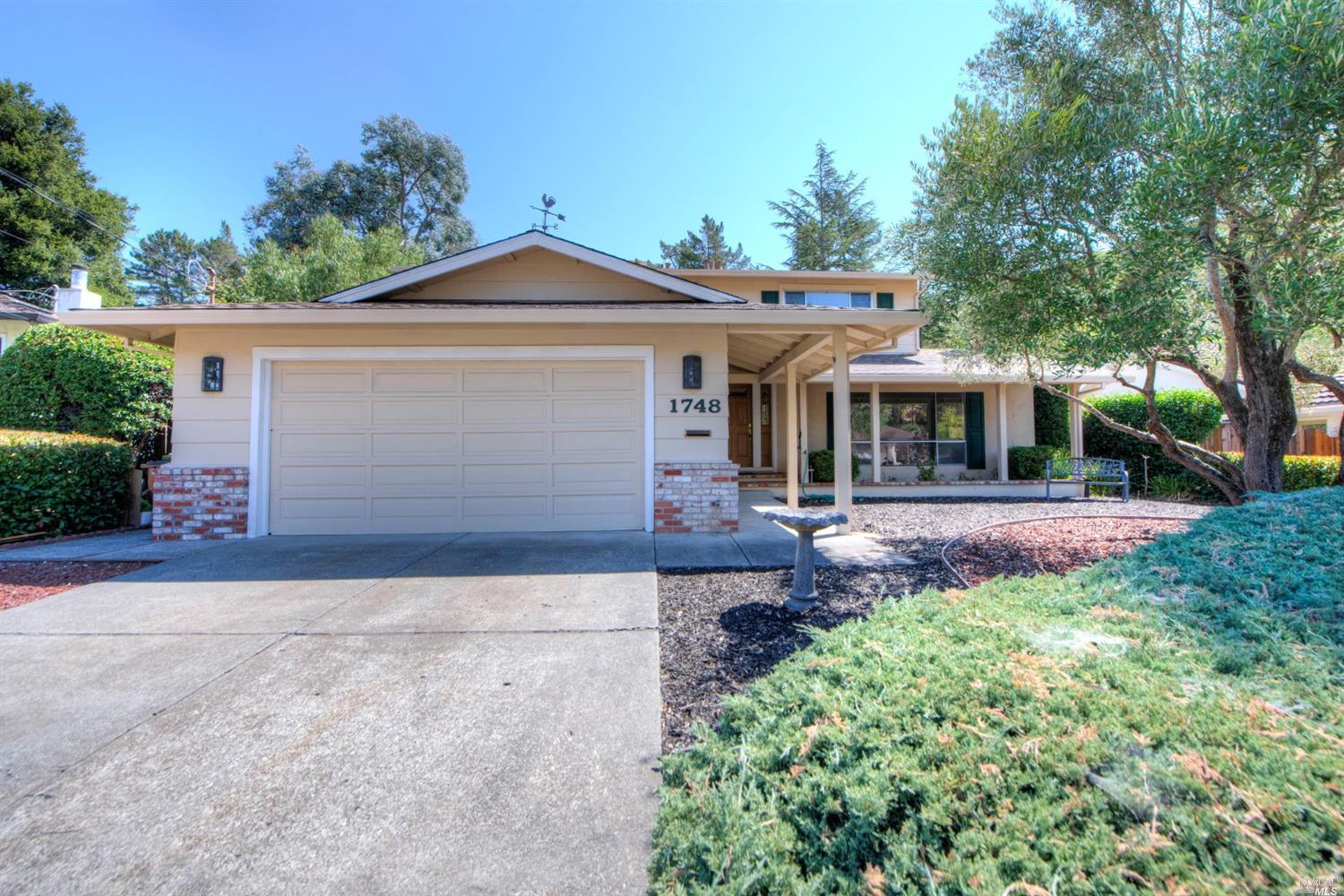 1748 Las Gallinas Avenue San Rafael, CA 94903 - Photo 1 of 1 front view of a house with a yard