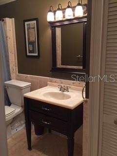 246 Afton Square, Unit 203 Altamonte Springs, FL 32714 - Photo 16 of 26 a bathroom with a sink and a mirror