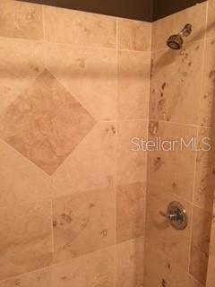 246 Afton Square, Unit 203 Altamonte Springs, FL 32714 - Photo 18 of 26 a bathroom with a shower