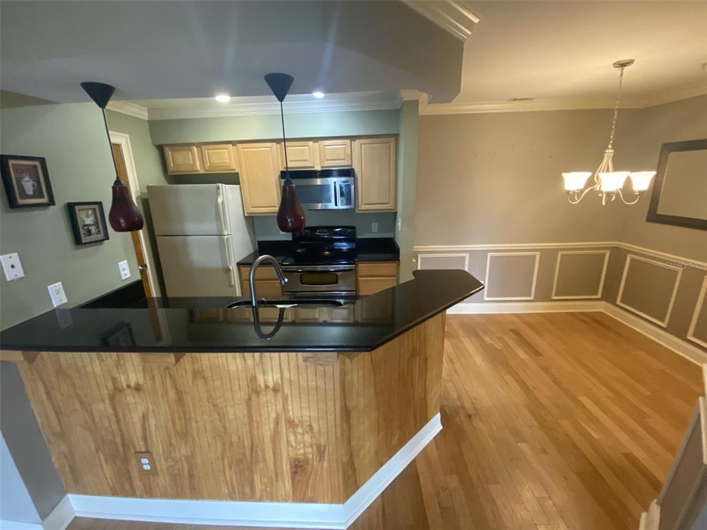 246 Afton Square, Unit 203 Altamonte Springs, FL 32714 - Photo 3 of 26 a view of a living room with furniture