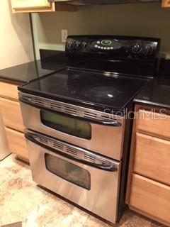 246 Afton Square, Unit 203 Altamonte Springs, FL 32714 - Photo 9 of 26 a close view of stove top oven