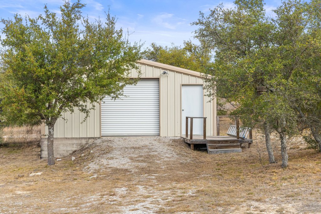 232 Crooked Oak Round Mountain, TX 78663 - Photo 33 of 40 View of garage