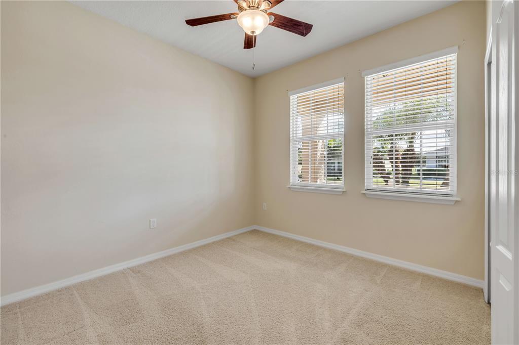 3329 Tuscano Avenue New Smyrna Beach, FL 32168 - Photo 19 of 36 a view of an empty room with a window