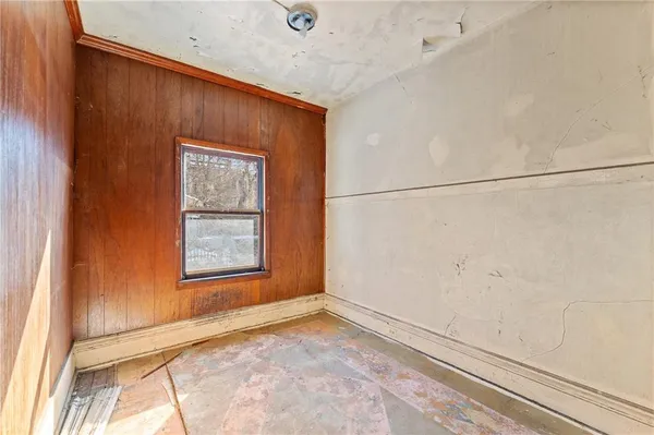 a view of a hallway with windows