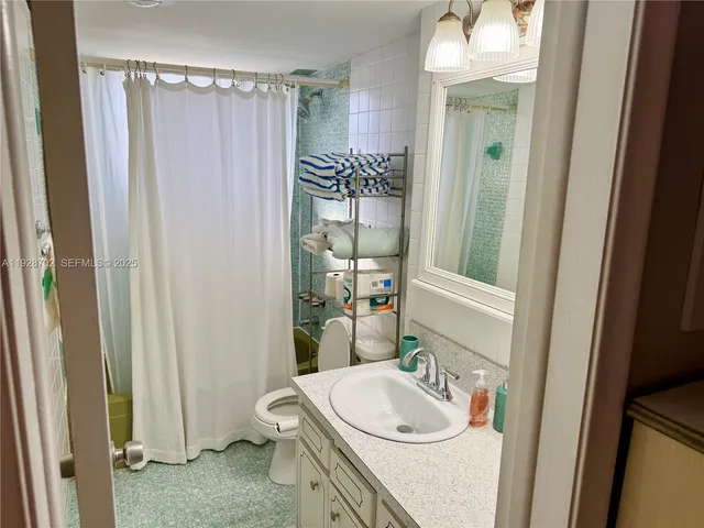 a view of entry way with wooden floor