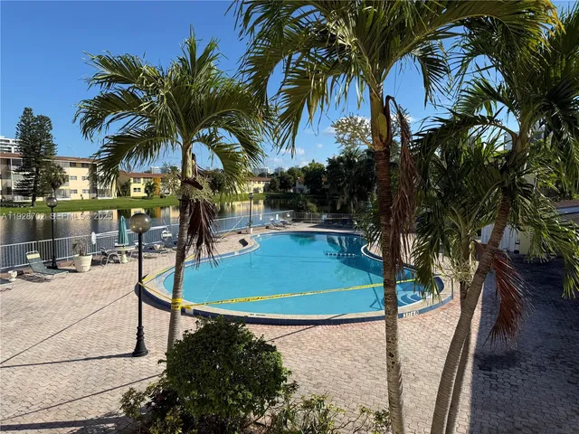 a park with lots of trees and plants