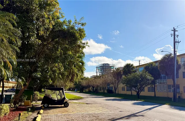 a group of people sitting at tables in a room