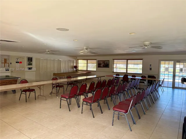 a living room with furniture and window