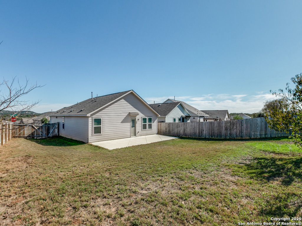 31593 Nimbus Drive Bulverde, TX 78163 - Photo 18 of 30 a house with yard in front of it