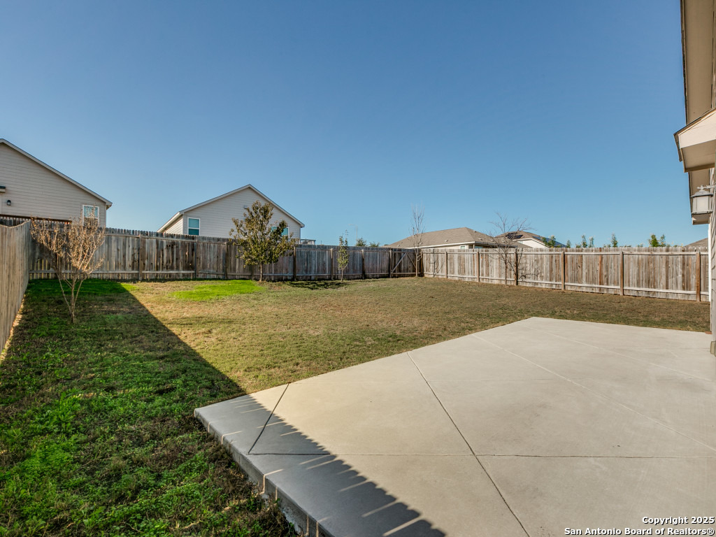 31593 Nimbus Drive Bulverde, TX 78163 - Photo 19 of 30 a view of a house with a yard