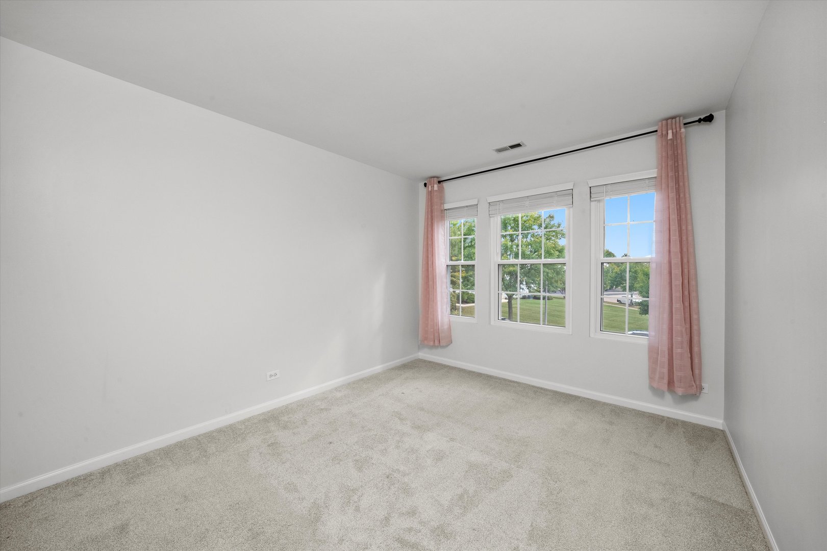 2468 Reflections Drive, Unit 2468 Aurora, IL 60502 - Photo 11 of 21 a view of an empty room with a window
