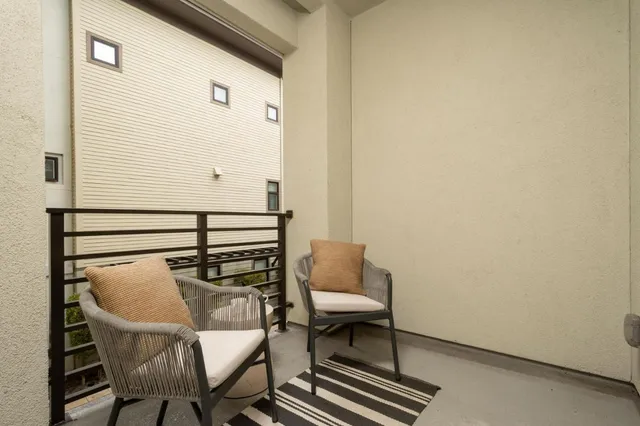 a bathroom with a double vanity sink toilet and shower