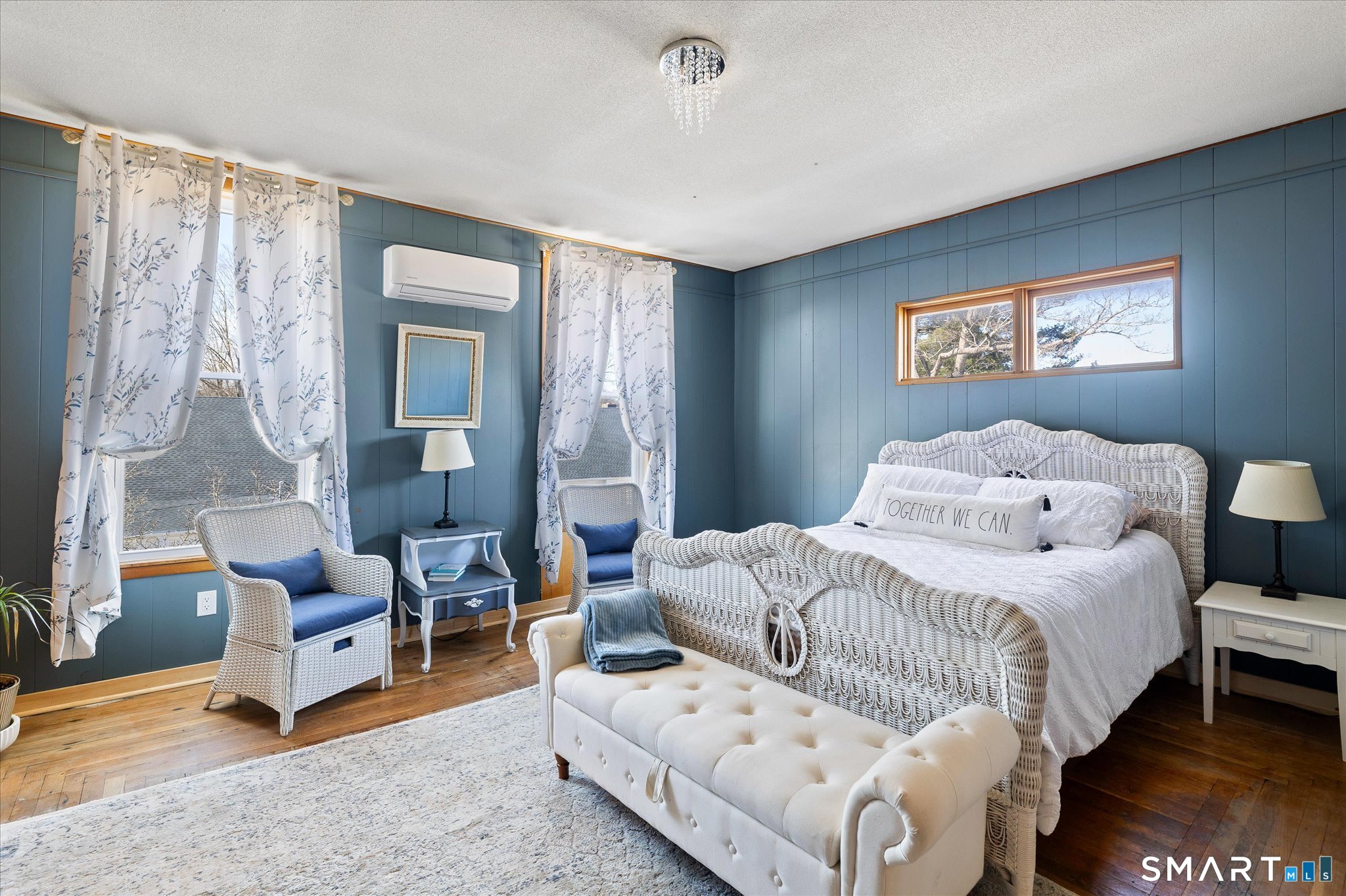 350 Hartford Pike Killingly, CT 06241 - Photo 12 of 32 a bedroom with a bed and a chandelier