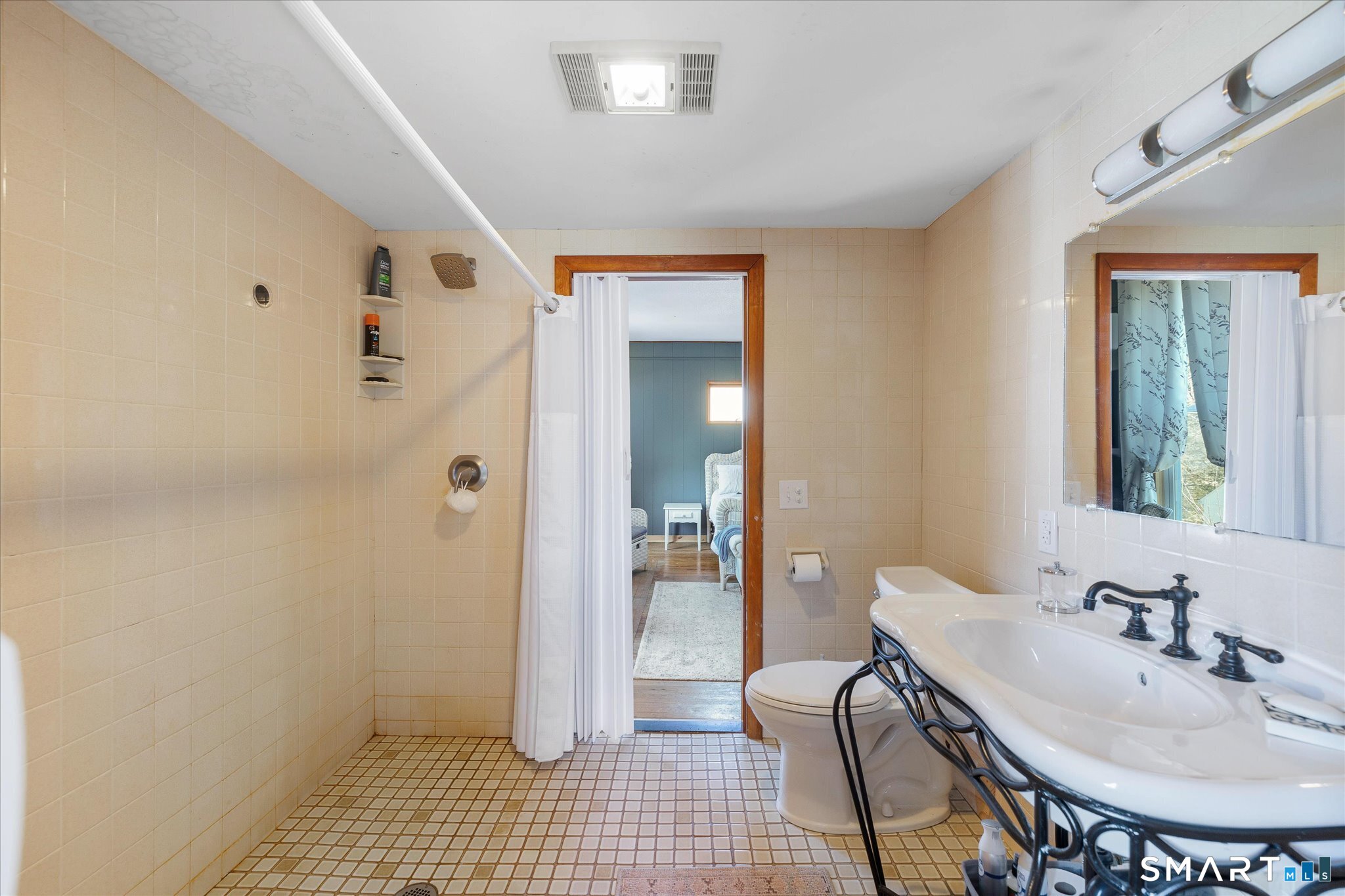 350 Hartford Pike Killingly, CT 06241 - Photo 13 of 32 a bathroom with a sink and a mirror