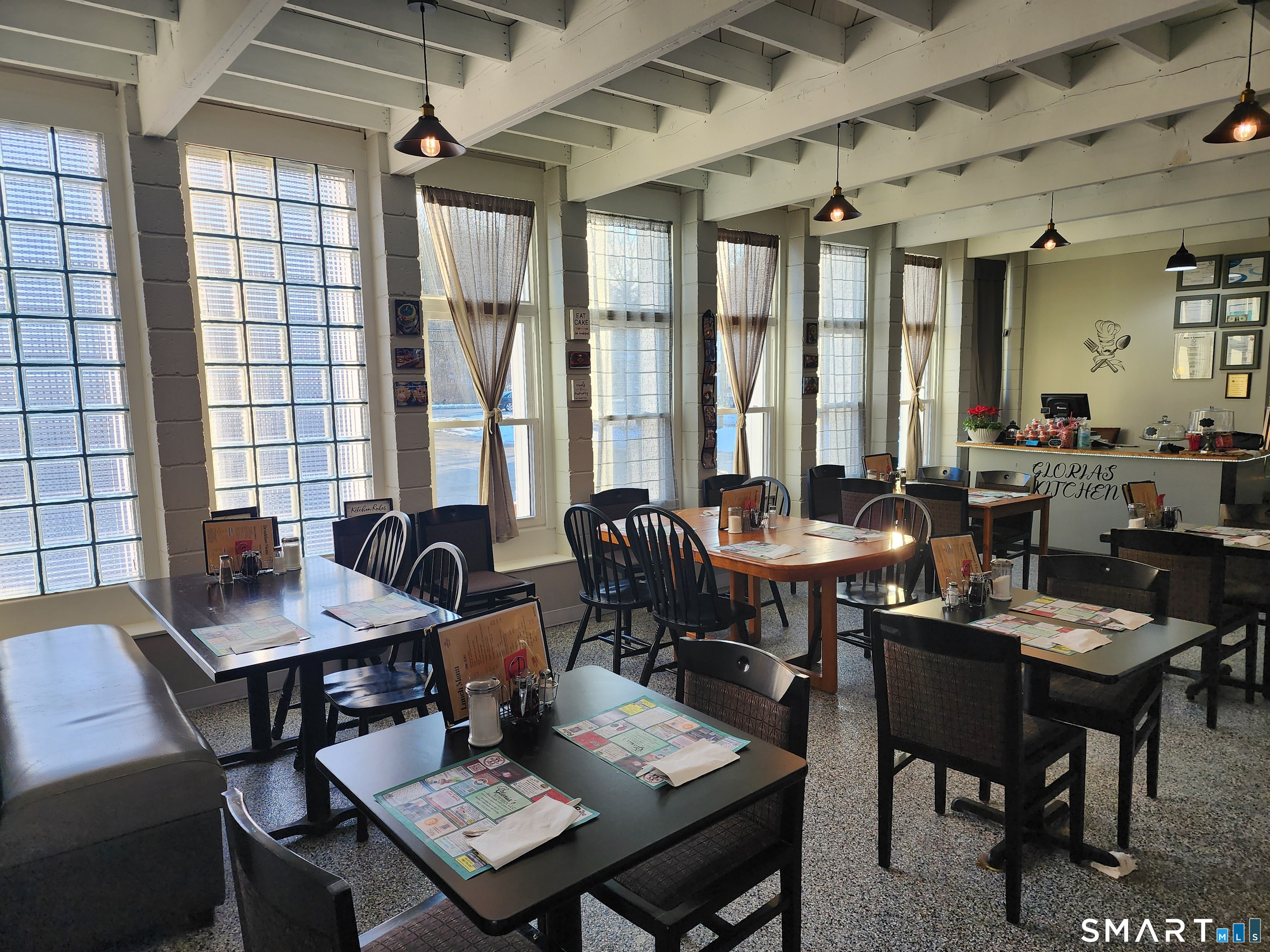 350 Hartford Pike Killingly, CT 06241 - Photo 17 of 32 a view of a dining room with furniture and window