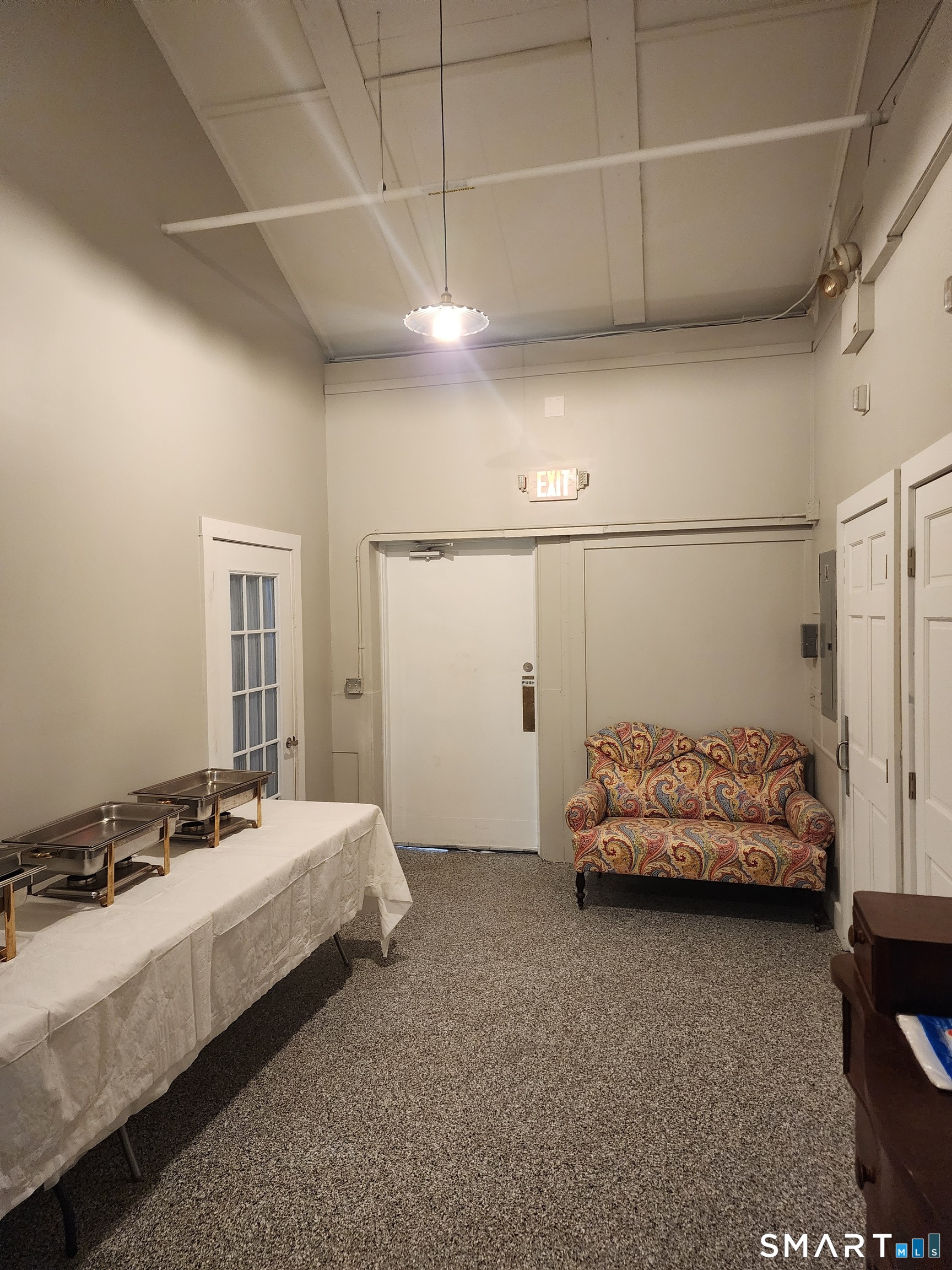 350 Hartford Pike Killingly, CT 06241 - Photo 20 of 32 a bedroom with a bed and a walk in closet