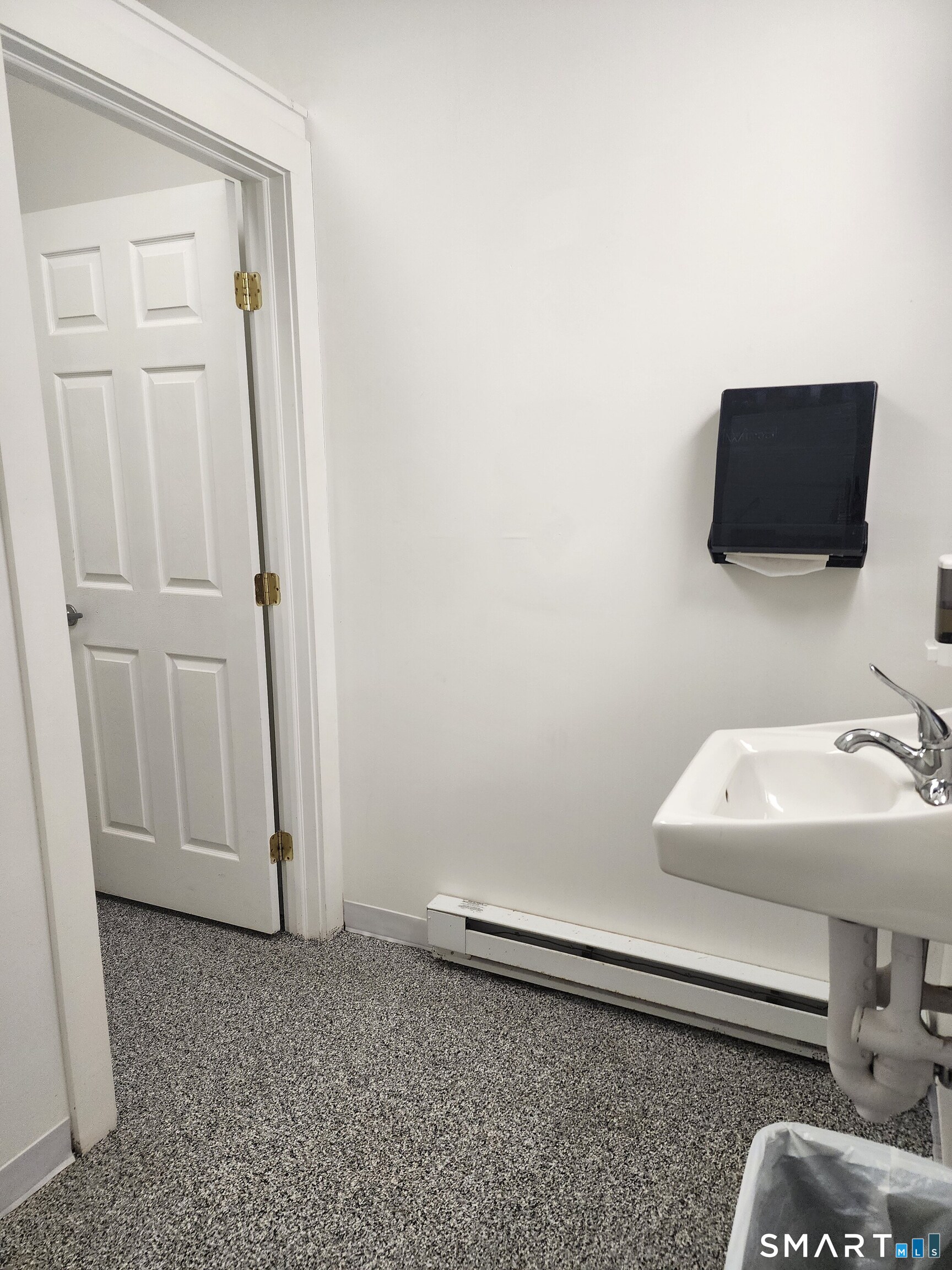 350 Hartford Pike Killingly, CT 06241 - Photo 21 of 32 a bathroom with a sink and a mirror