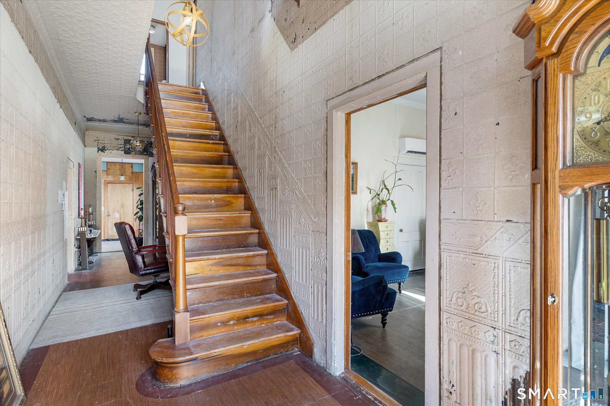 350 Hartford Pike Killingly, CT 06241 - Photo 3 of 32 a view of hallway with stairs and wooden floor