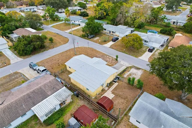 aerial view of a house with outdoor space