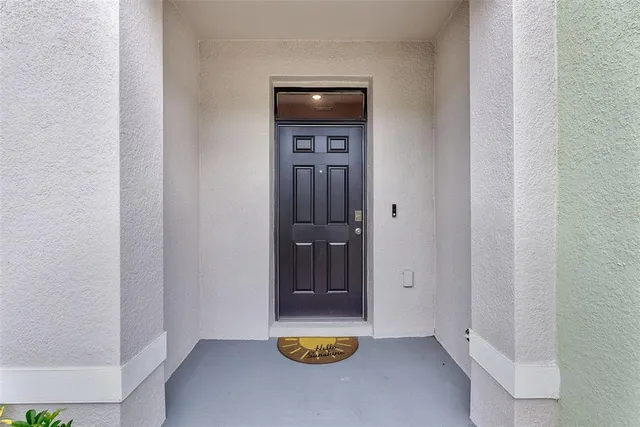 a view of house with yard and porch