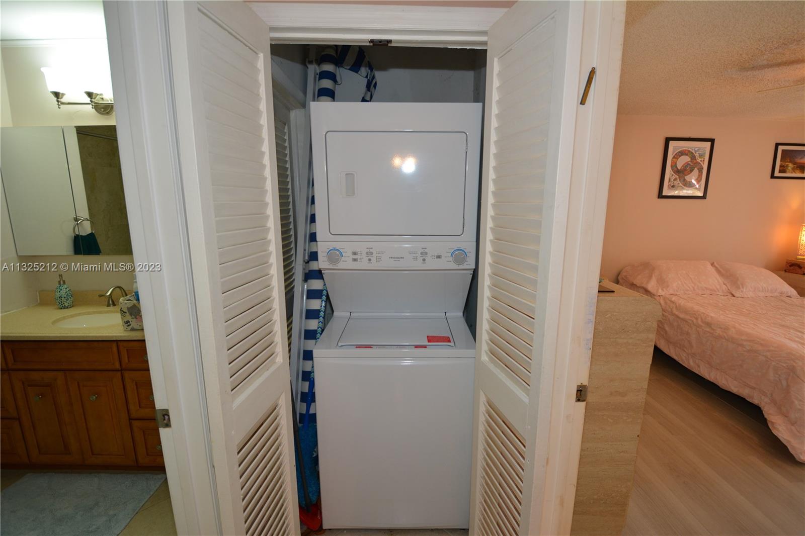 8936 Belle Aire Court, Unit 375 Boca Raton, FL 33433 - Photo 27 of 32 a bathroom with a sink and toilet