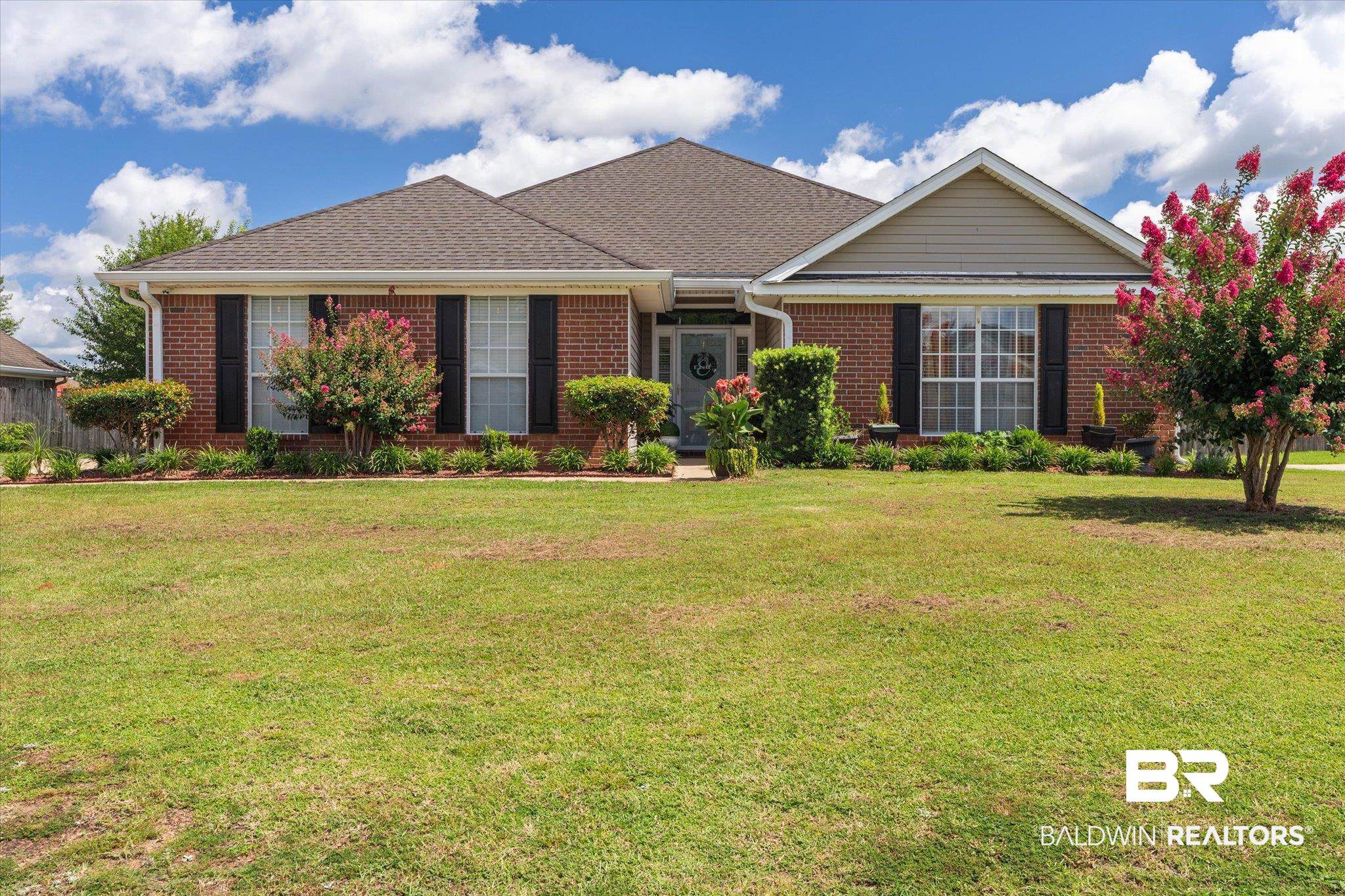 8600 Sable Court Semmes, AL 36575 - Photo 1 of 20 Ranch-style home with brick siding and a front yard