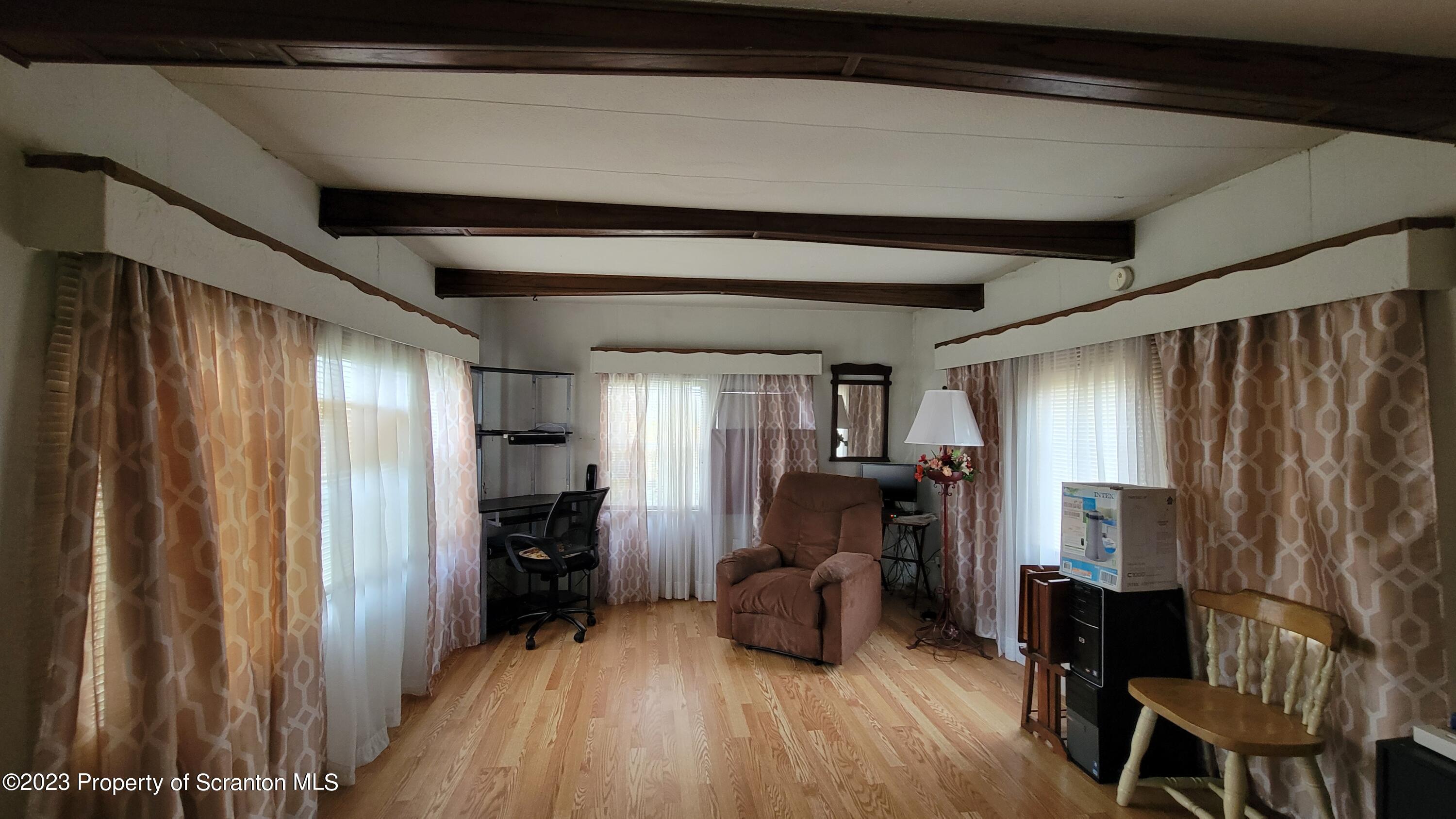 64 Franklin Street Great Bend, PA 18821 - Photo 12 of 17 a view of livingroom with furniture and staircase