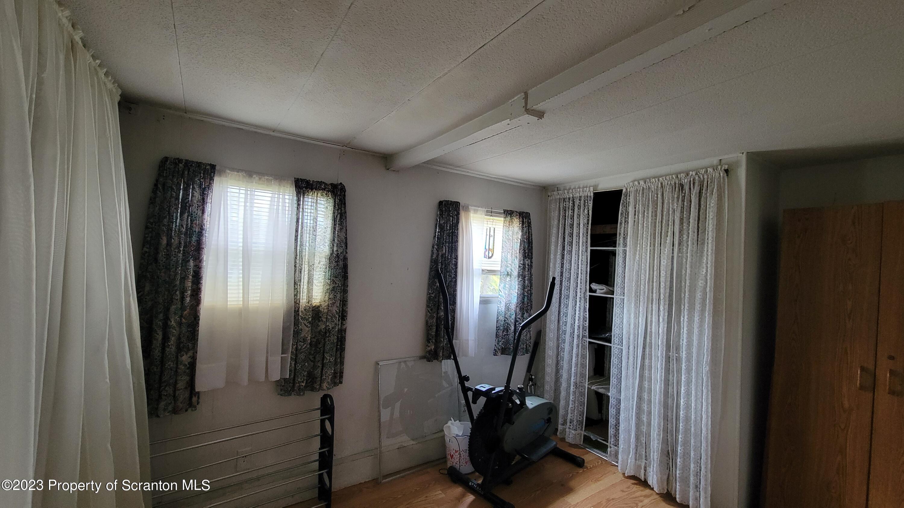 64 Franklin Street Great Bend, PA 18821 - Photo 13 of 17 a view of a hallway with closet area