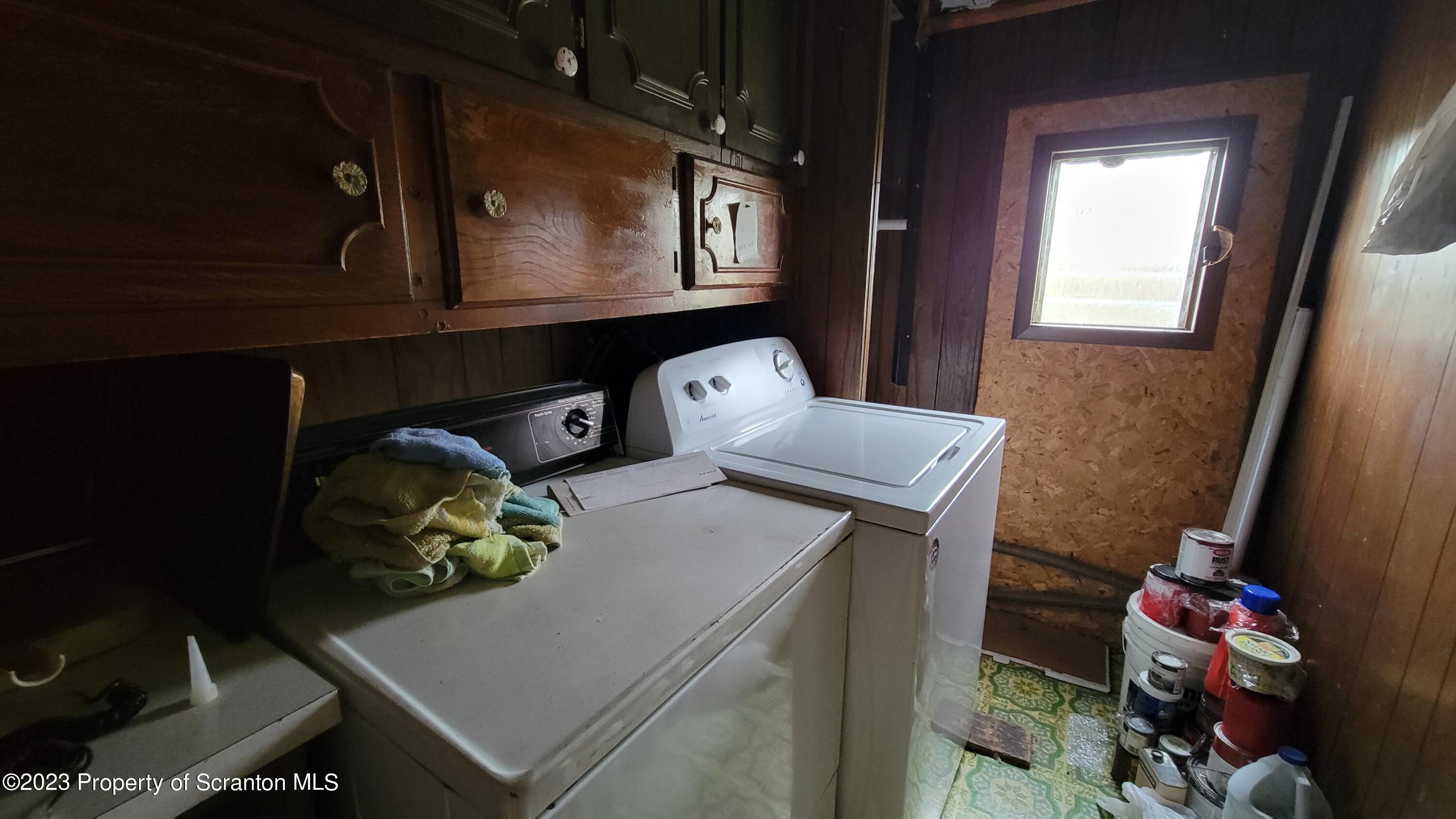 64 Franklin Street Great Bend, PA 18821 - Photo 16 of 17 a utility room with dryer and washer