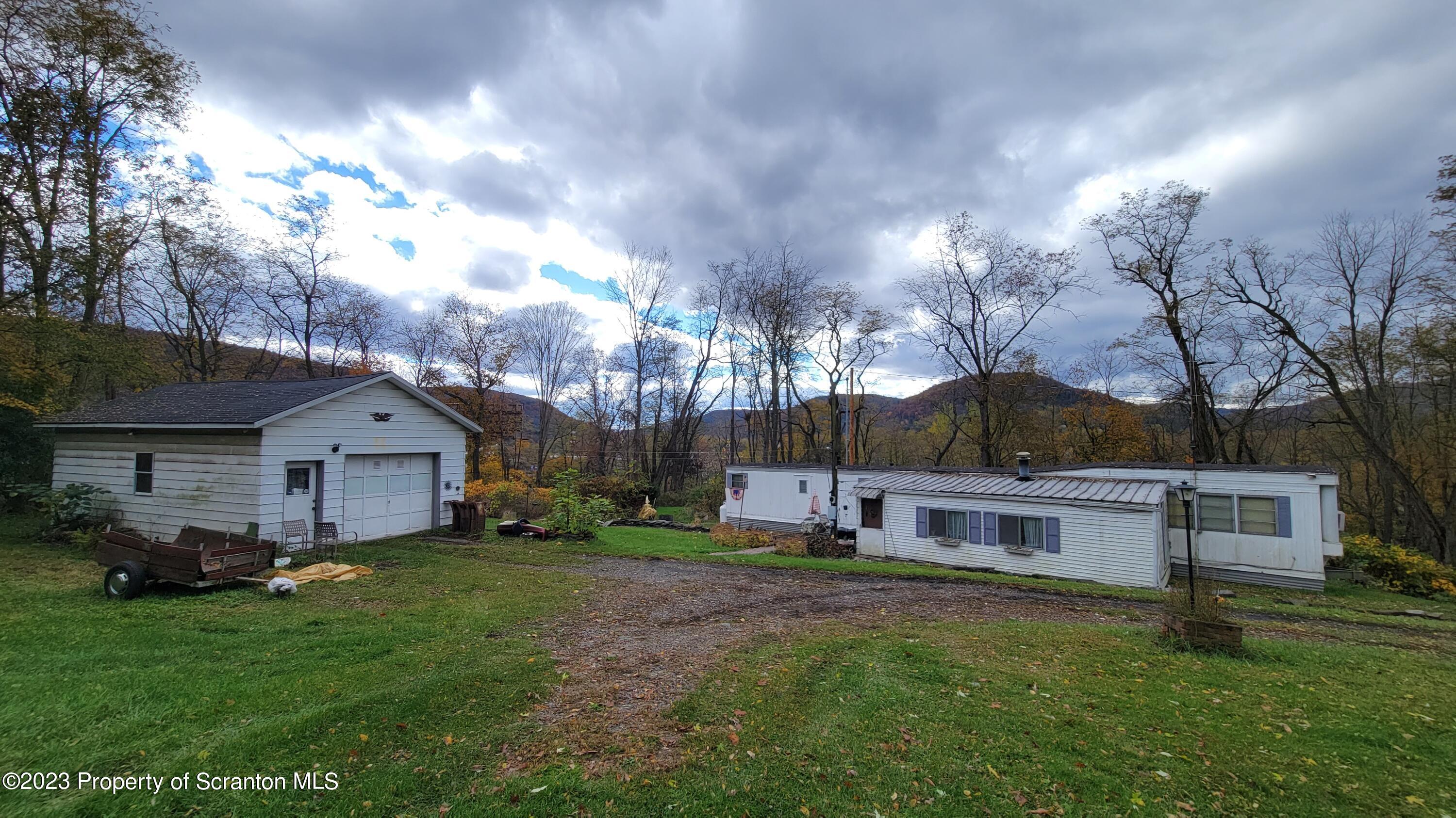 64 Franklin Street Great Bend, PA 18821 - Photo 2 of 17 a view of a house with a back yard