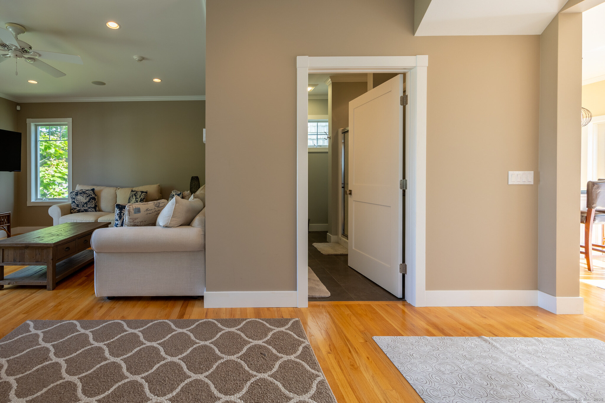 7 Saye Street Old Saybrook, CT 06475 - Photo 10 of 29 a bedroom with a bed and a couch